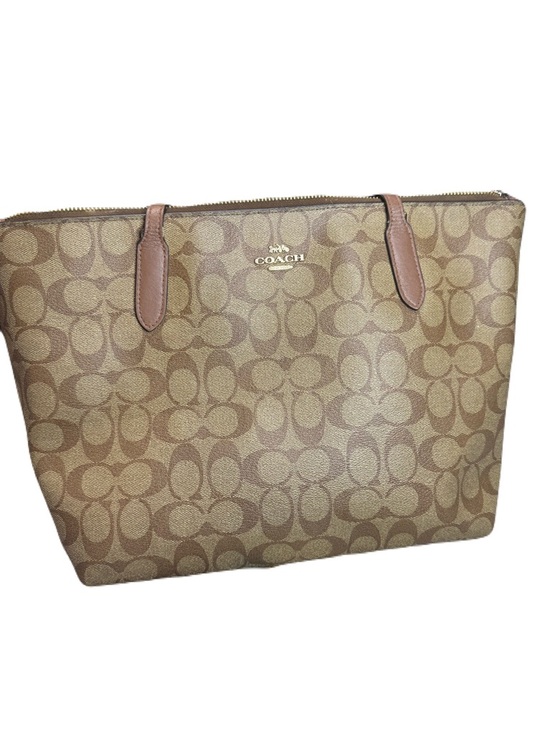 Coach Handbags - Coach City Tote Bag
In Signature Canvas